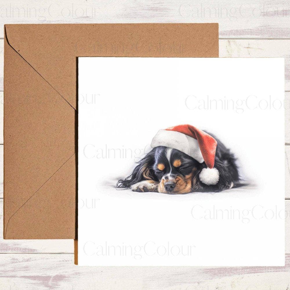 Cavalier King Charles Spaniel sleeping wearing Red Santa Hat | Christmas Card | Christmas Card