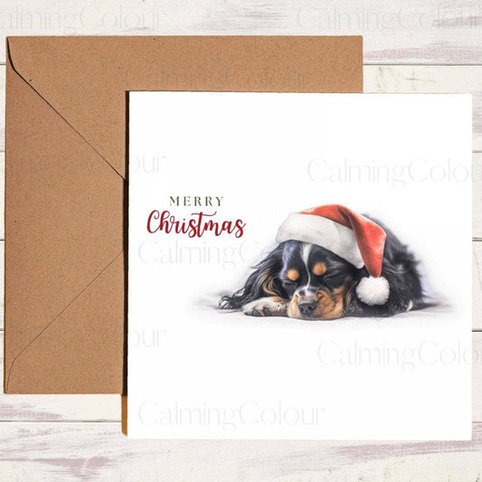 Cavalier King Charles Spaniel sleeping wearing Red Santa Hat | Christmas Card | Christmas Card