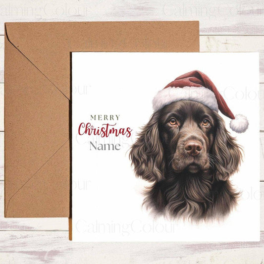 Personalised Chocolate Sprocker wearing Red Santa Hat | Christmas Card | Christmas Card (Personalised)