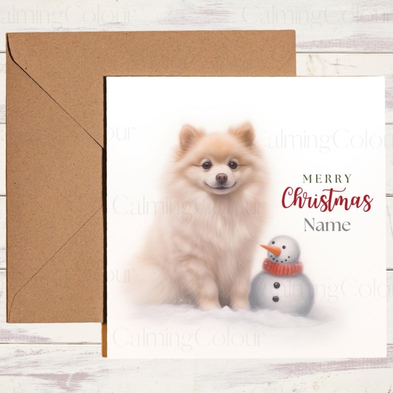 Pomeranian Watching Mini Snowman | Christmas Card | Christmas Card