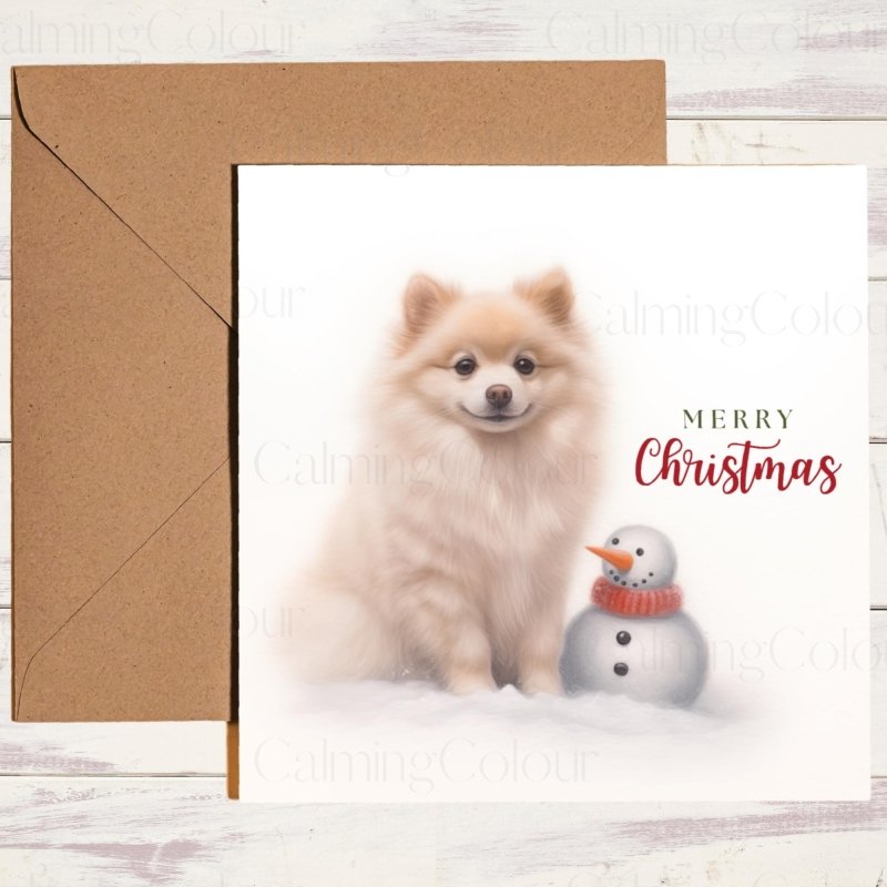 Pomeranian Watching Mini Snowman | Christmas Card | Christmas Card