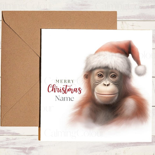 Young Orangutan Wearing a Santa Hat | Christmas Card | Christmas Card