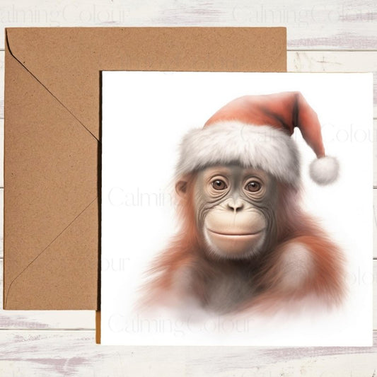 Young Orangutan Wearing a Santa Hat | Christmas Card | Christmas Card